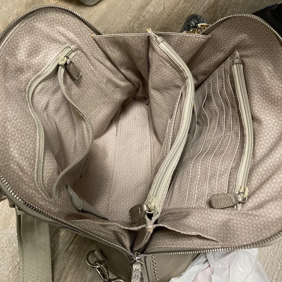 Brighton convertible handbag/backpack new with tag and discover in orig box and